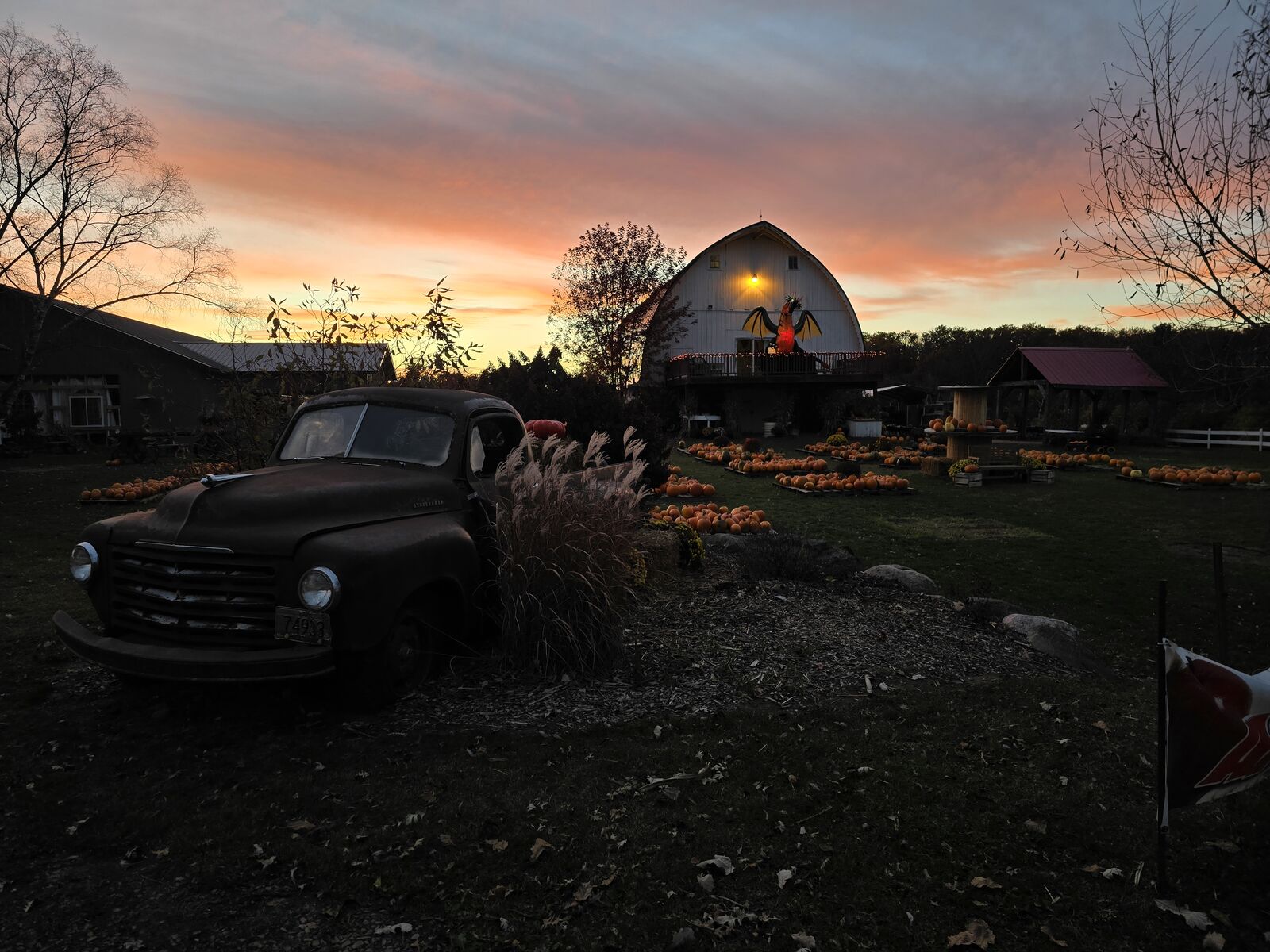 Vintage truck and barn at golden hour